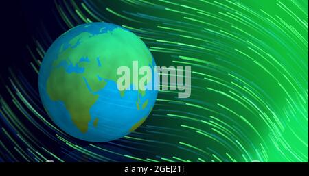 Rotating earth over green light trails Stock Photo