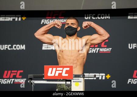 Las Vegas, USA. 20th Aug, 2021. LAS VEGAS, NV - AUGUST 20: Ramiz Brahimaj steps on the scale for the official weigh-ins at UFC Apex for UFC Fight Night - Vegas 34 - Weigh-ins on August 20, 2021 in Las Vegas, NV, United States. (Photo by Louis Grasse/PxImages) Credit: Px Images/Alamy Live News Stock Photo