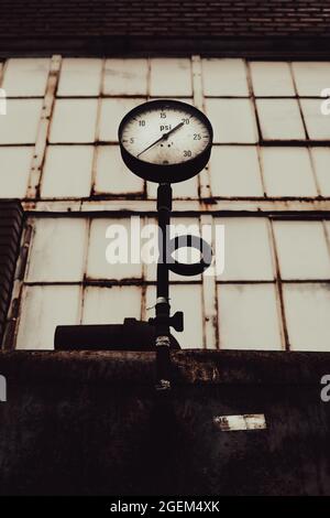 Pressure gauge on an abandoned old tank Stock Photo - Alamy