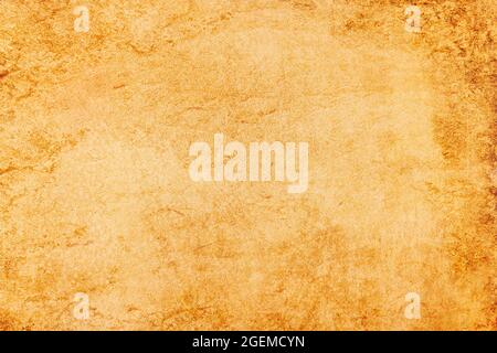A sheet of blank, aged parchment paper for use as a background with complete copy space for use as a design element. Stock Photo