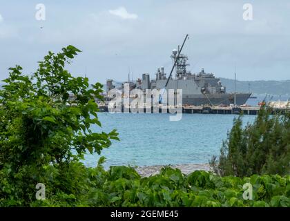 WHITE BEACH, Japan (Aug. 11, 2021) Whidbey Island-class dock landing ship USS Germantown (LSD 42) sits pier side at White Beach Naval Facility, Okinawa, Japan Aug.11, 2021. USS Germantown, part of the America Expeditionary Strike Group, along with the 31st Marine Expeditionary Unit, is operating in the U.S. 7th Fleet area of responsibility to enhance interoperability with allies and partners and serve as a ready response force to defend peace and stability in the Indo-Pacific region. (U.S. Navy photo by Mass Communication Specialist 1st Class David R. Krigbaum) Stock Photo