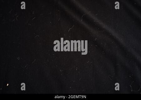 messy and dirty black cloth texture. soft cloth for writing background, design material or decoration. wavy fabric texture Stock Photo