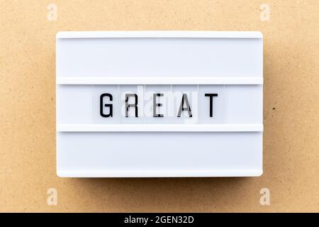 Light box with word great on wood background Stock Photo