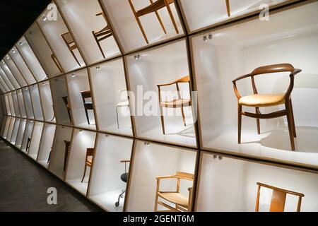 COPENHA, DENMARK - Aug 16, 2018: The display of iconic Danish chairs in the Designmuseum in Copenhagen , Denmark Stock Photo