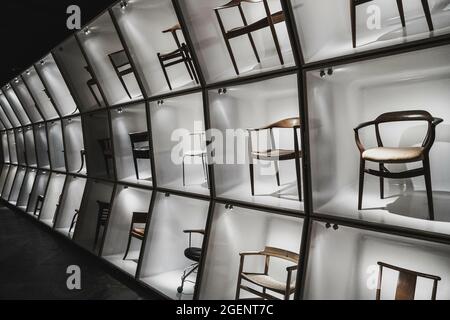 COPENHA, DENMARK - Aug 16, 2018: The display of iconic Danish chairs in the Designmuseum in Copenhagen , Denmark Stock Photo