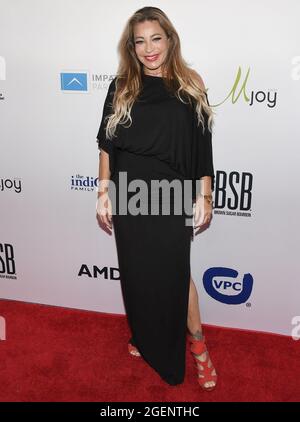 Los Angeles, USA. 20th Aug, 2021. Taylor Dayne arrives at the 21st Annual Harold and Carole Pump Foundation Gala held at the Beverly Hilton in Beverly Hills, CA on Friday, ?August 20, 2021. (Photo By Sthanlee B. Mirador/Sipa USA) Credit: Sipa USA/Alamy Live News Stock Photo