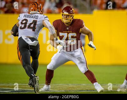 Washington Football Team offensive tackle Cornelius Lucas (78) warms up  before an NFL football game against the New York Giants on Sunday, Jan. 9,  2022, in East Rutherford, N.J. (AP Photo/Adam Hunger