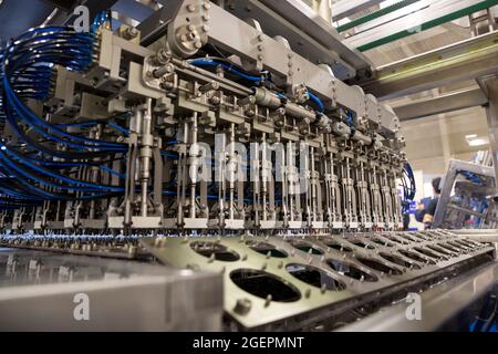 Automatic food packing machine for industrial use. Stock Photo