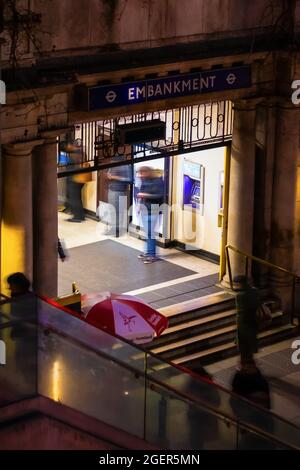 Night time shot of the entrance to Embankment Tube station taken from above Stock Photo