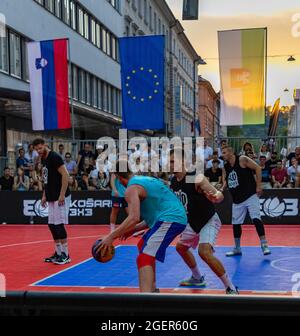 A picture of two teams playing 3x3 basketball on a special event in Ljubljana. Stock Photo