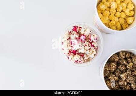 Top view shot of sweet fried popcorn in a bowl on the white background Stock Photo