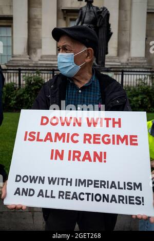 London, UK.  21 August 2021.  People at a protest in Trafalgar Square in solidarity with the people of Afghanistan and against the Taliban who took over the country on 15 August.  People were also protesting against the Islamic regime in Iran.  Credit: Stephen Chung / Alamy Live News