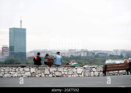 Belgrade, Serbia - September 27, 2019: Group of young overlooking New Belgrade municipality of the city of Belgrade from Kalemegdan public park Stock Photo