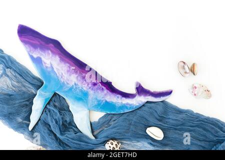 Resin art whale and sea shells on white background. Flat lay Stock Photo