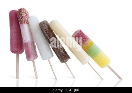 Frozen assorted ice lollies on a white background Stock Photo