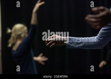 dancer hand gesture move with bg dancing jam intentionally with motion blur ond defocus bokeh Stock Photo