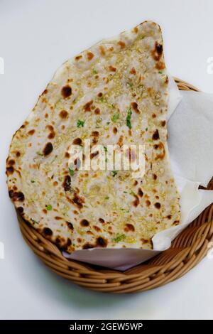 tandoori garlic naan bread, indian clay oven baked bread Stock Photo