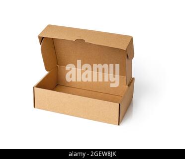 Empty cardboard box for packing parcels isolated on a white background. New brown gift box with open lid. Recycled container for parcel packaging. Stock Photo