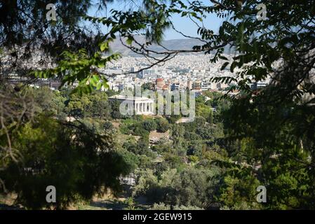 Landscape with scenic view of Temple of Hephaestus a Doric style historic monument at the north-west side of the Roman Agora in Athens, Greece. Stock Photo