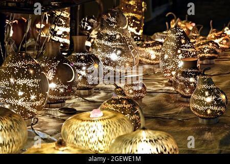 Bunch of magical beautiful handcrafted lamps in a stall at the San Teodoro street market Stock Photo