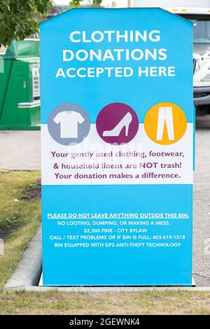 August 21 2021 - Calgary , Alberta Canada - Charity Clothing Collection bin for donations Stock Photo