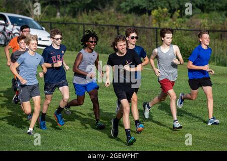 Danville, United States. 21st Aug, 2021. Runners are seen at the start of the 9th Annual Danville Cross Country 5K Community Run/Walk.The event, which benefits the Danville Area High School girls and boys cross country teams, resumed after being canceled in 2020 due to the COVID-19 pandemic. Credit: SOPA Images Limited/Alamy Live News Stock Photo