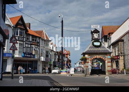 The town centre in Sheringham with the old clock shelter built in 1862 Stock Photo