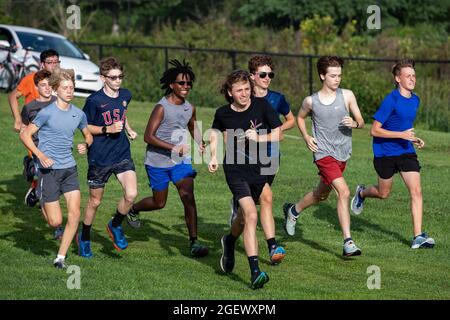 Danville, United States. 21st Aug, 2021. Runners are seen at the start of the 9th Annual Danville Cross Country 5K Community Run/Walk.The event, which benefits the Danville Area High School girls and boys cross country teams, resumed after being canceled in 2020 due to the COVID-19 pandemic. (Photo by Paul Weaver/SOPA Images/Sipa USA) Credit: Sipa USA/Alamy Live News Stock Photo