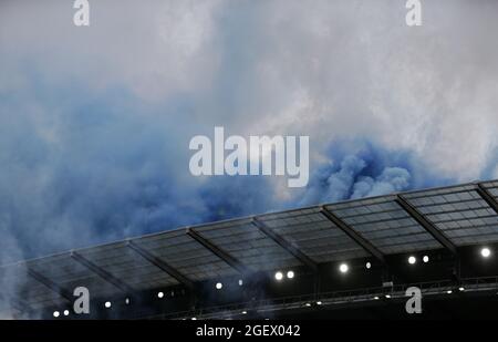 21st August 2021; Manchester City Stadium, Manchester, England, Premier League football, Manchester City versus Norwich; fireworks and blue flares are released to welcome the 202021 Premier League Champions to their first match at the Etihad Stadium Stock Photo