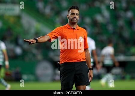 Lisbon, Portugal. 21st Aug, 2021. Referee Manuel Oliveira gestures during the Portuguese League football match between Sporting CP and Belenenses SAD at Jose Alvalade stadium in Lisbon, Portugal on August 21, 2021. (Credit Image: © Pedro Fiuza/ZUMA Press Wire) Stock Photo