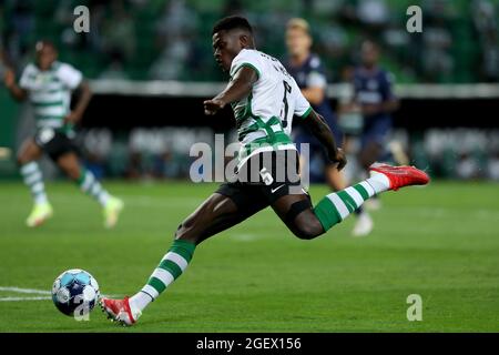 Lisbon, Portugal. 21st Aug, 2021. Nuno Mendes of Sporting CP in action during the Portuguese League football match between Sporting CP and Belenenses SAD at Jose Alvalade stadium in Lisbon, Portugal on August 21, 2021. (Credit Image: © Pedro Fiuza/ZUMA Press Wire) Stock Photo