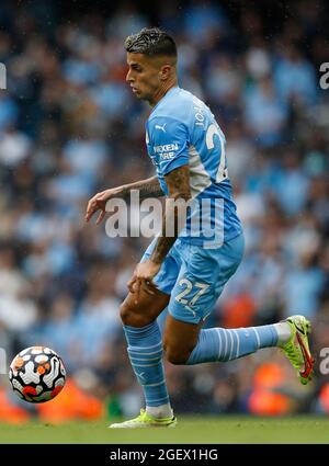 Manchester, England, 21st August 2021.  Joao Cancelo of Manchester City during the Premier League match at the Etihad Stadium, Manchester. Picture credit should read: Darren Staples / Sportimage Stock Photo