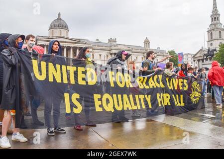 London, UK. 21st Aug, 2021. Demonstrators hold a 'United For Black Lives' banner during the Kill The Bill protest.Demonstrators gathered in Trafalgar Square in protest against the Police, Crime, Sentencing and Courts Bill. Credit: SOPA Images Limited/Alamy Live News Stock Photo
