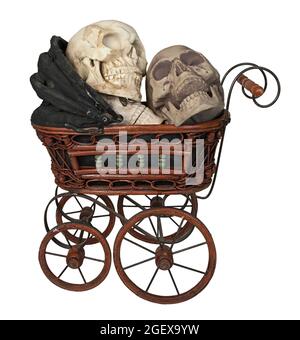 Black Bassinet full of Skulls with eye sockets and teeth - path included Stock Photo