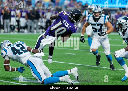 August 21, 2021: Carolina Panthers safety Sam Franklin (42) hits Baltimore Ravens wide receiver Jaylon Moore (10) before the first down in the NFL matchup at Bank of America Stadium in Charlotte, NC. (Scott Kinser/Cal Sport Media) Stock Photo