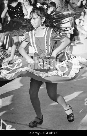 Austin Texas USA, circa 1990: Young Hispanic dancers perform during Dies Y Seis festival celebrating Mexican Independence Day.  ©Bob Daemmrich Stock Photo