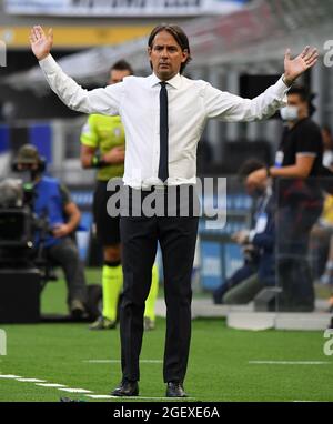Milan, Italy. 21st Aug, 2021. FC Inter's head coach Simone Inzaghi gestures during a Serie A football match between FC Inter and Genoa in Milan, Italy, on Aug. 21, 2021. FC Inter won 4-0. Credit: Alberto Lingria/Xinhua/Alamy Live News Stock Photo