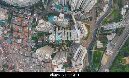 Aerial view of 'Taman Anggrek' the biggest shopping mall and apartment in Jakarta when sunrise. Jakarta, Indonesia, August 22, 2021 Stock Photo