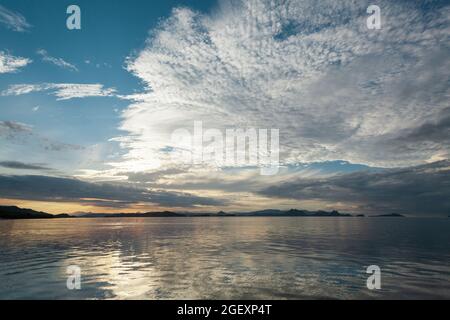 Sunset sky filled with cirrocumulus clouds  Stock Photo