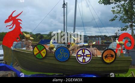 Skeleton crew - Viking boat at Kirkcudbright Aug 2021 - part of an open air  summer display at Kirkcudbright, Dumfries & Galloway, Scotland Stock Photo