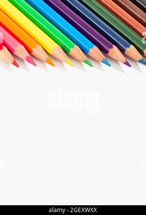 Border frame of Colored pencils isolated on white background. Copy space for text or drawings Stock Photo