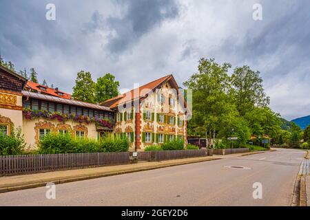 Oberammergau is a municipality in the district of Garmisch-Partenkirchen, in Bavaria, Germany. The small town on the Ammer River is known for its wood Stock Photo