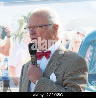 Borgholm, Sweden. 22nd Aug, 2021. King Carl XVI Gustaf and Queen Silvia of Sweden attending the Swedish Royal Rally (Svenska Kungsrallyt) on Öland, Sweden, on August 21, 2021. This year, the Swedish Royal Rally was held for the fourteenth time and celebrated its 25th anniversary. The biennial Royal Rally is an event focusing on old cars. The King arrived at the event field driving his Volvo PV60 car, which was at the same age with him. Photo by Sigge Klemetz/Stella Pictures/ABACAPRESS.COM Credit: Abaca Press/Alamy Live News Stock Photo