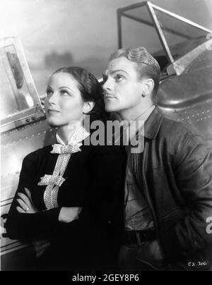 JUNE TRAVIS and JAMES CAGNEY publicity portrait in CEILING ZERO 1936 director HOWARD HAWKS play / screenplay Frank Wead costume design Orry-Kelly Cosmopolitan Productions / Warner bros. Stock Photo