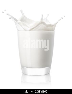glass of milk with splash isolated on white Stock Photo