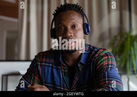 Portrait of African American man talk on video call Stock Photo