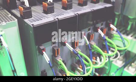Advance automatic electric inverter with Ethernet cables, industrial Electrical high performance communication system or machine panel control contact Stock Photo