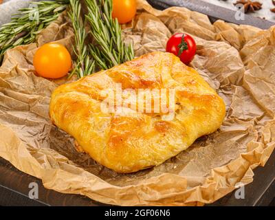 Caucasian traditional cuisine - Layered Khachapuri with cheese Stock Photo