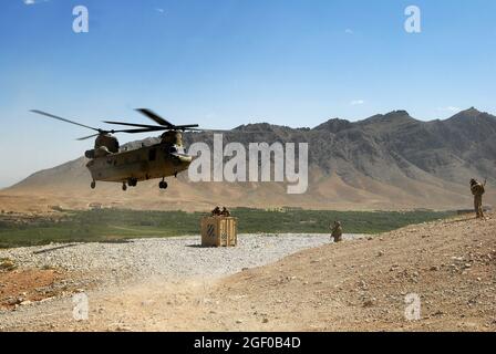 https://l450v.alamy.com/450v/2gf0b4d/a-ch-47-chinook-is-guided-toward-a-container-for-sling-load-in-chorah-afghanistan-may-12-2013-the-chinooks-flown-by-members-of-bravo-company-2nd-battalion-104th-aviation-regiment-from-the-connecticut-and-pennsylvania-army-national-guard-have-played-a-vital-part-in-the-mission-in-afghanistan-since-their-arrival-in-dec-2012-by-performing-resupply-retrograde-and-planned-missions-us-army-photo-by-sgt-jessi-ann-mccormick-2gf0b4d.jpg