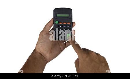 Holding electronic calculator isolated on white background. Male hand holding electronic. Stock Photo